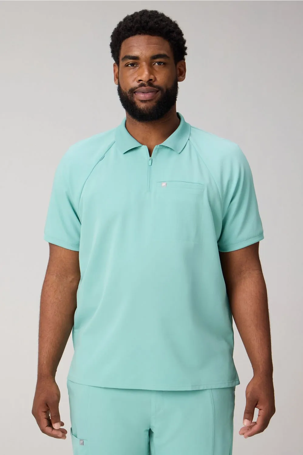 All-Day Scrub Zip Polo sold by Fabletics