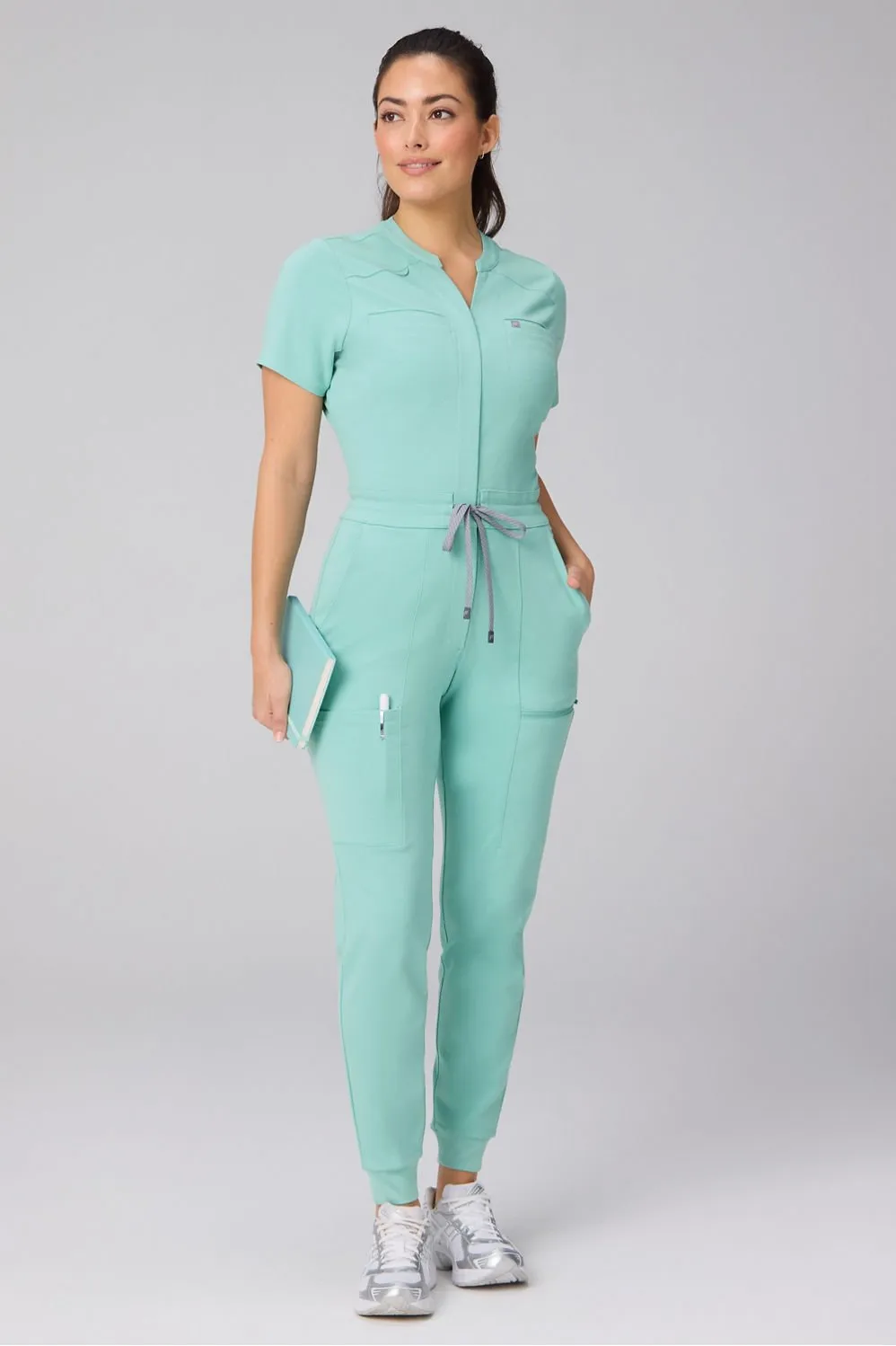 StretchTech™ Empower Scrub Jumpsuit sold by Fabletics