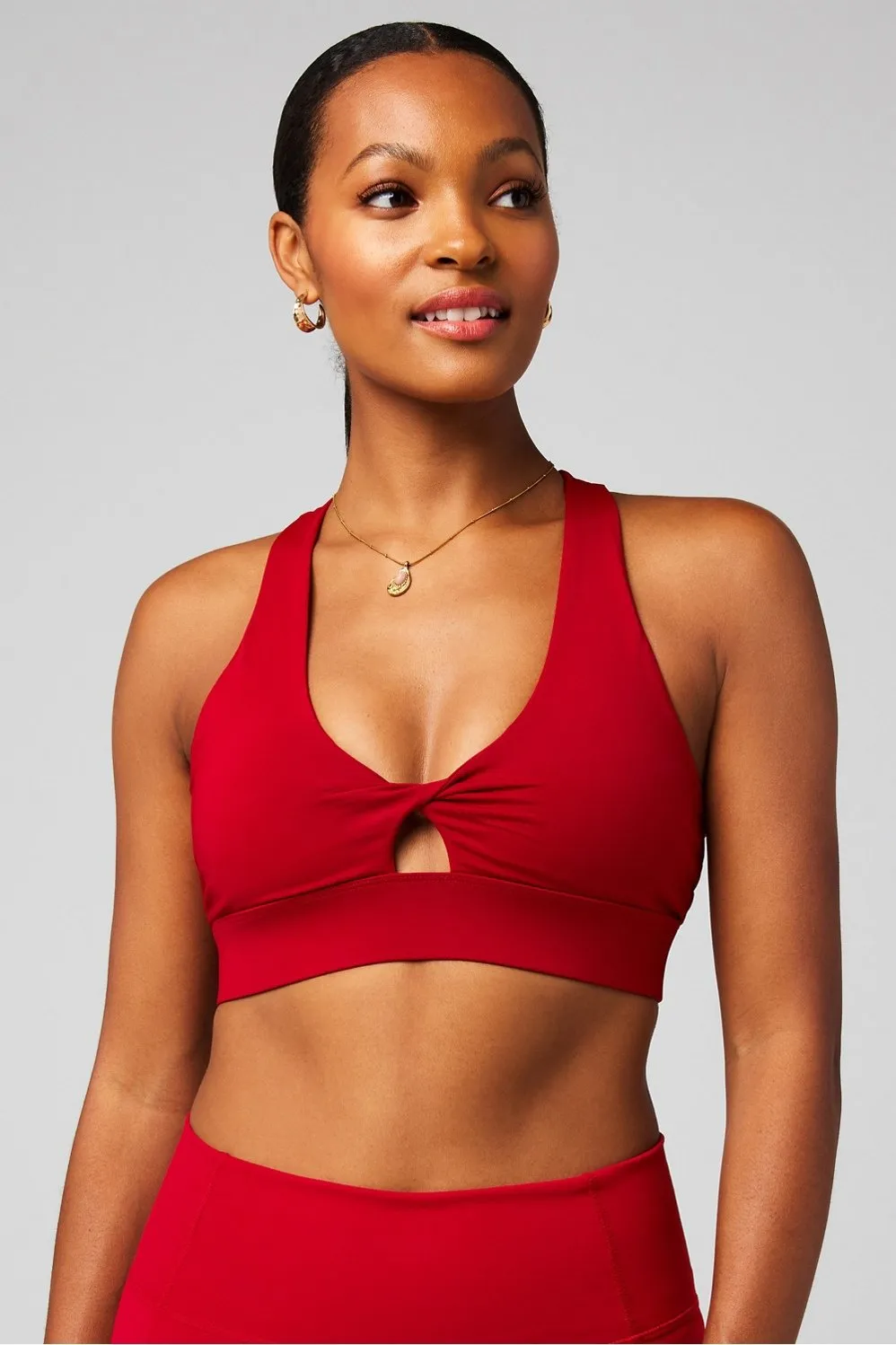 Oasis Twist Medium Impact Sports Bra sold by Fabletics