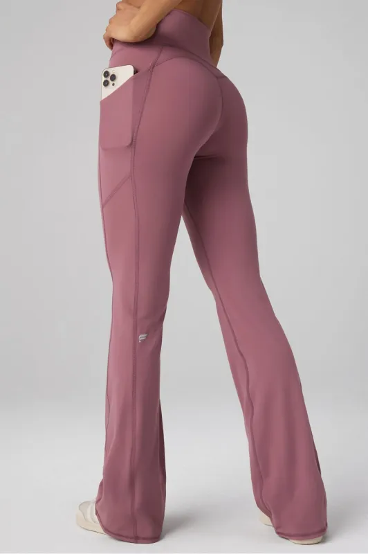 Oasis High-Waisted Pocketed Kick Flare sold by Fabletics