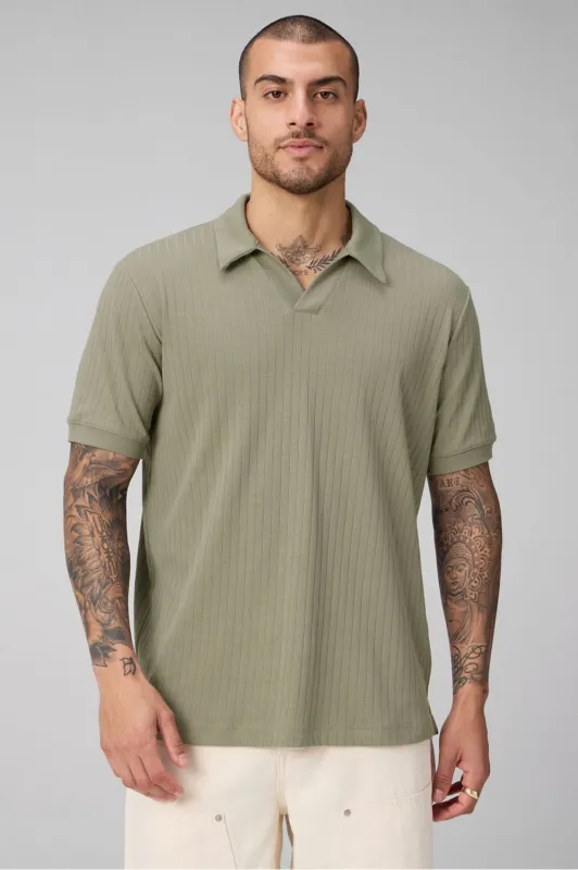 The 24-7 Ribbed Johnny Collar Polo made by Fabletics