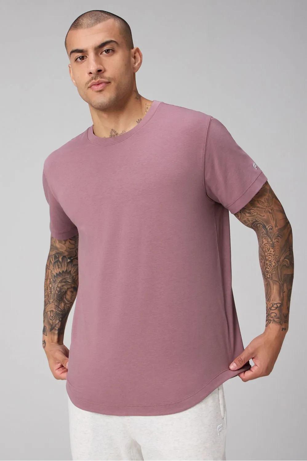 The 24-7 Tee (Curved Hem) sold by Fabletics