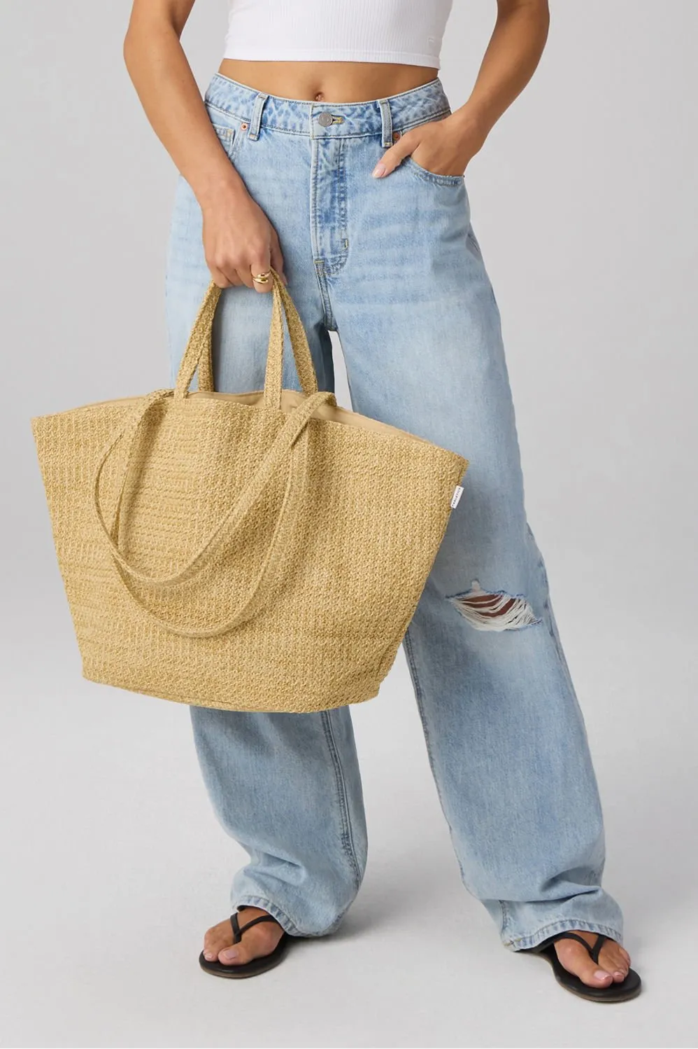 The Raffia Beach Bag sold by Fabletics