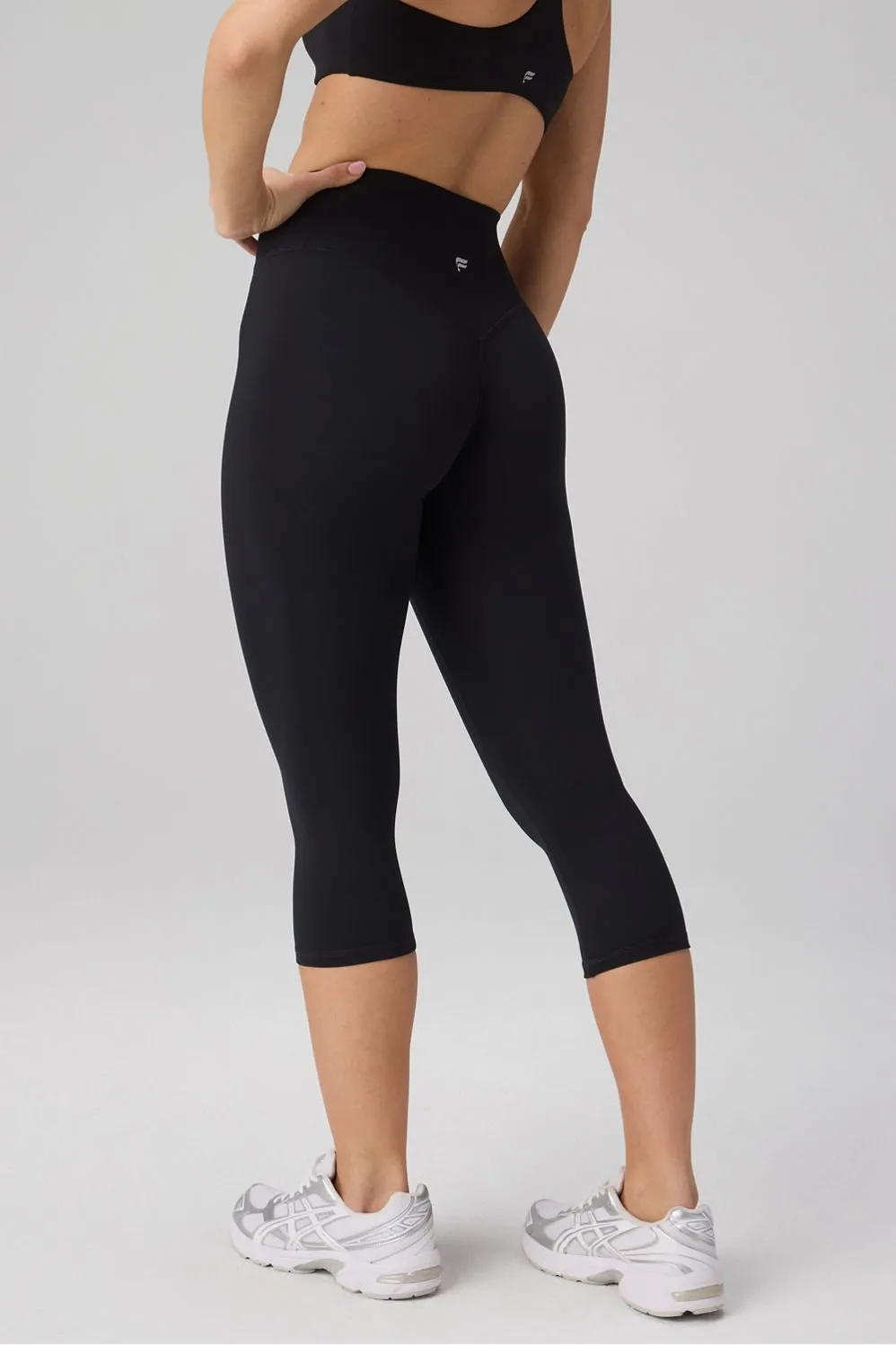 The No-Seam PureLuxe TLC High-Waisted Capri 22" sold by Fabletics