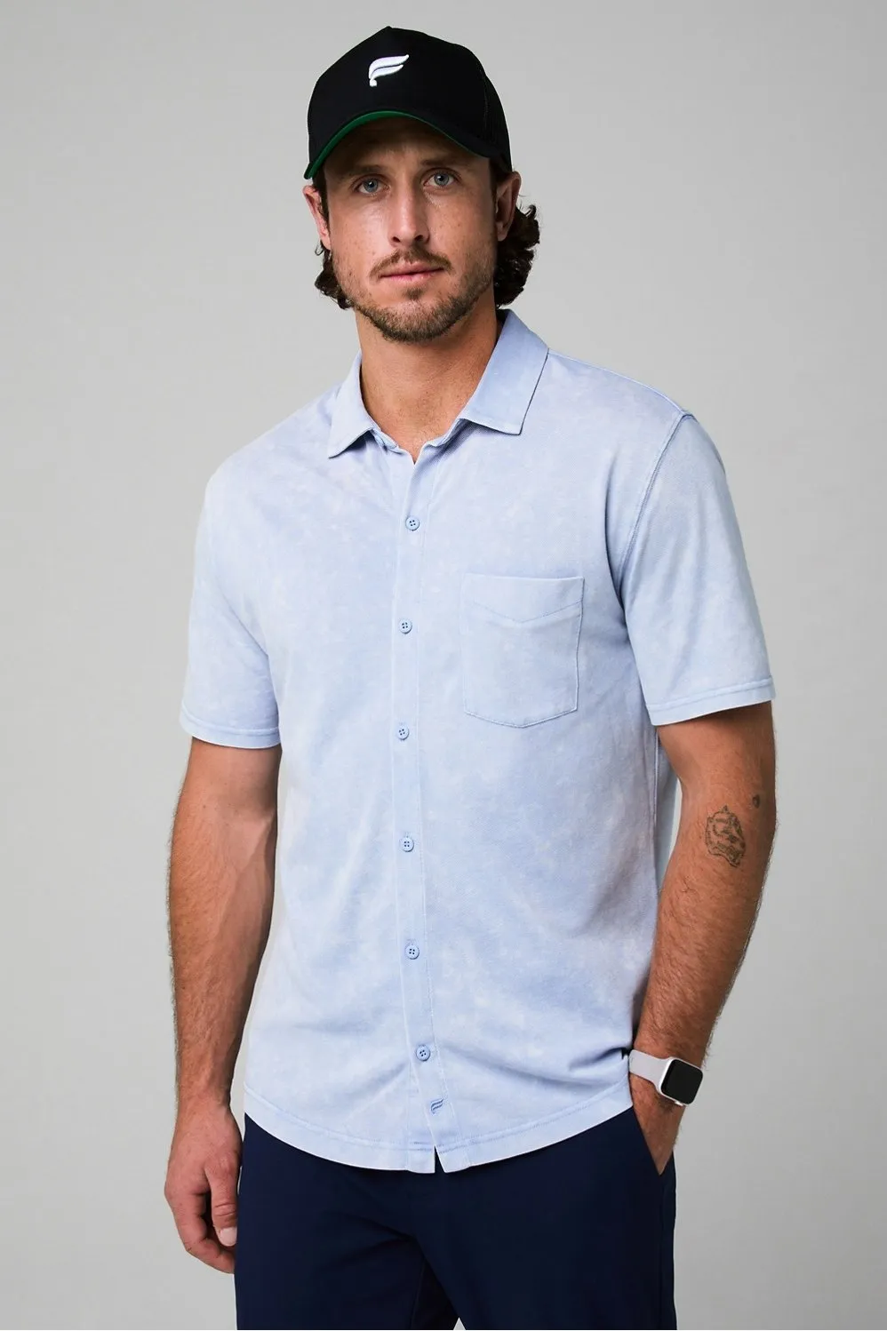 The Dash Short Sleeve Button Up sold by Fabletics