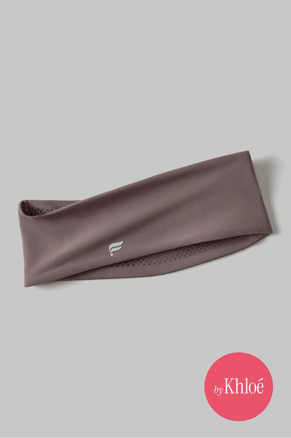 The Powergrip Pureluxe Headband sold by Fabletics