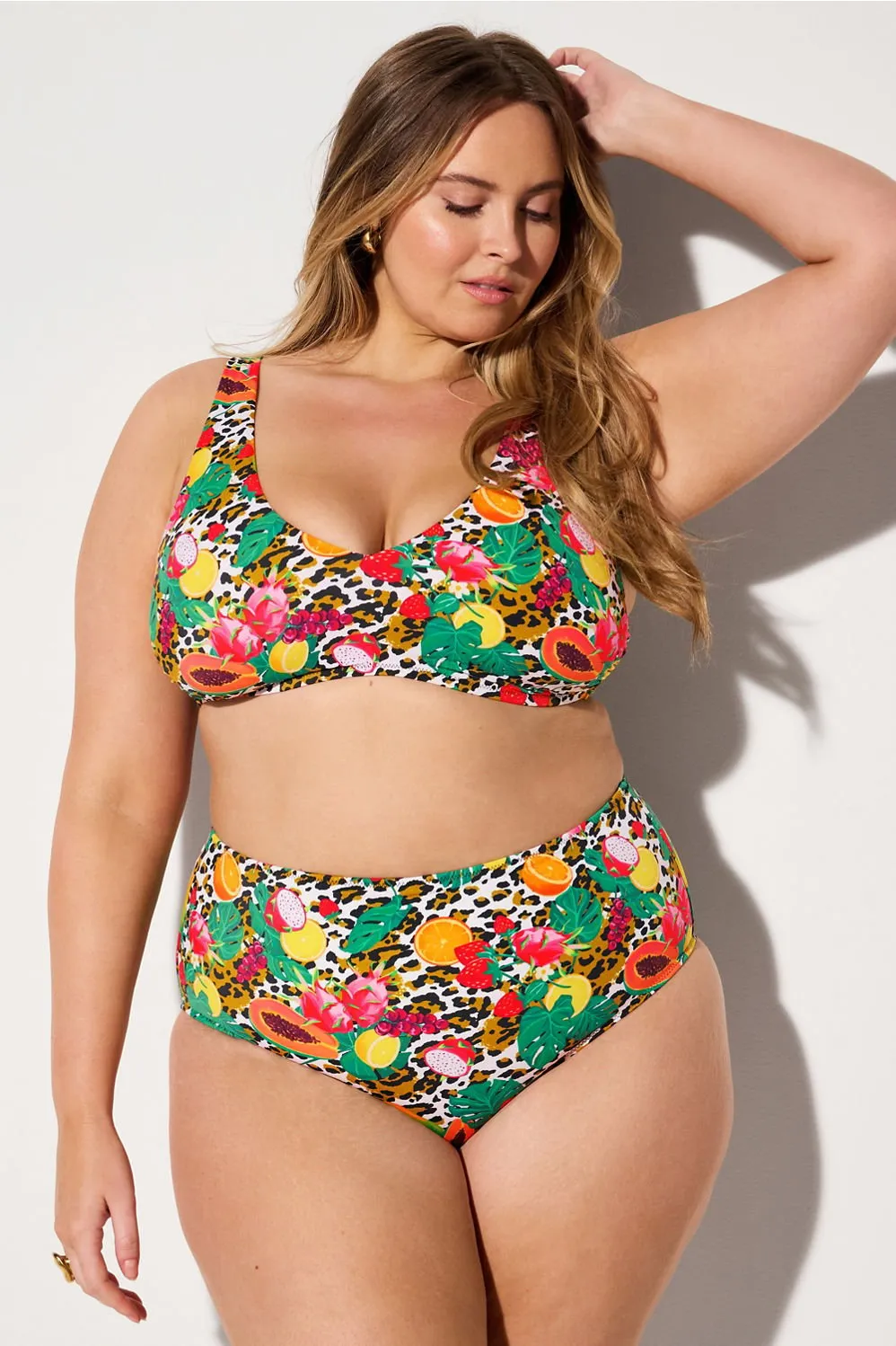 Shaping Swim Plunge Bikini Top sold by Fabletics