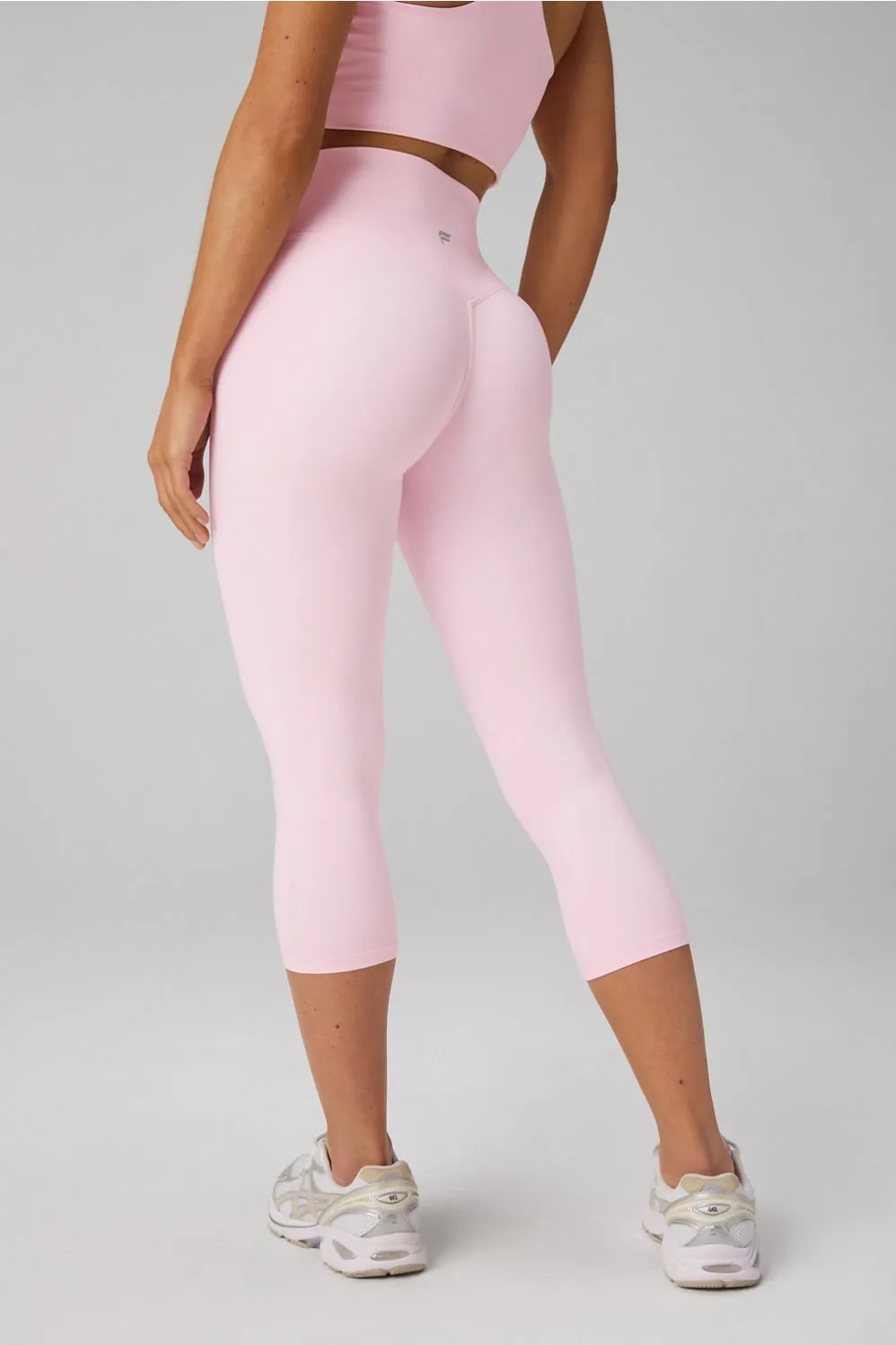 The No-Seam PureLuxe TLC High-Waisted Capri sold by Fabletics