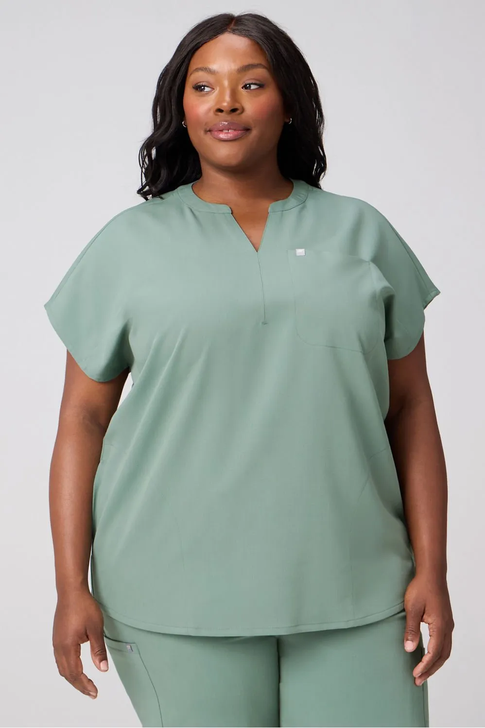 Evolve Oversized Scrub Top sold by Fabletics