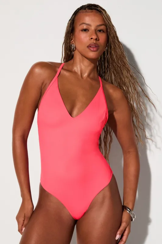 Cross Back One Piece Swimsuit made by Fabletics