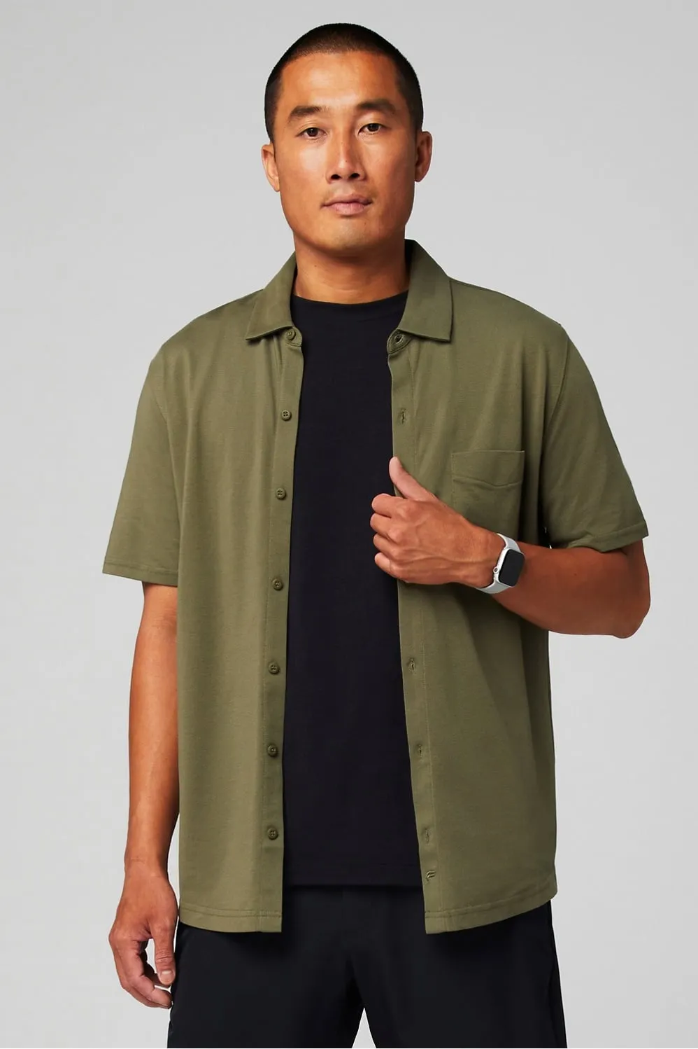 The Dash Short Sleeve Button Up sold by Fabletics