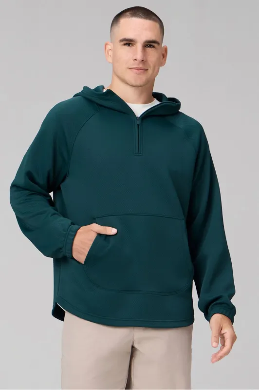 The GridTech Quarter Zip Hoodie made by Fabletics