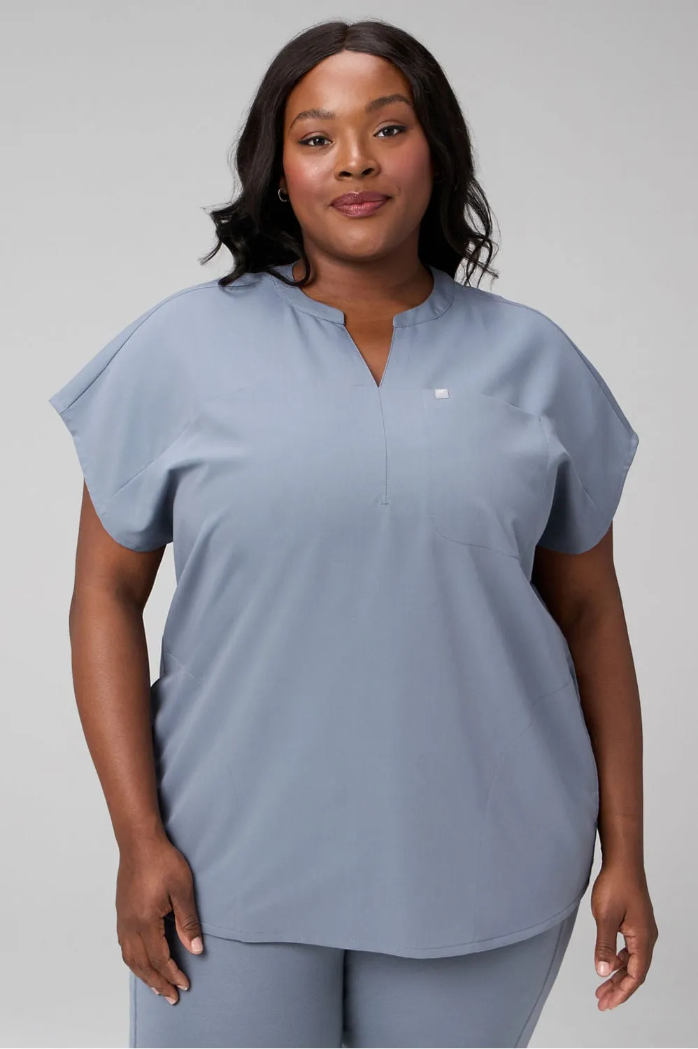 Evolve Oversized Scrub Top sold by Fabletics