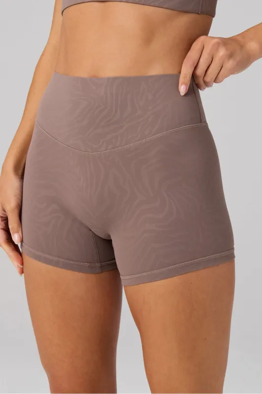 The No-Seam PureLuxe TLC Short 4" made by Fabletics