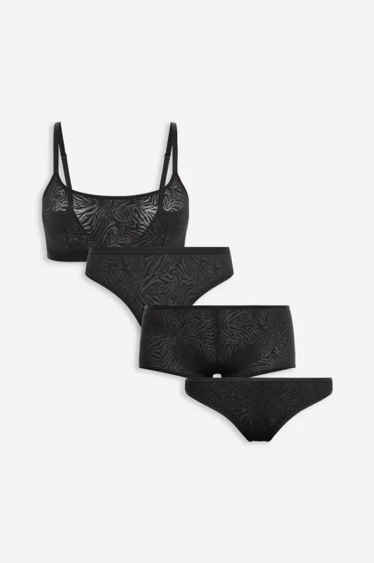 Mesh Essentials 4-Piece Bundle made by Fabletics