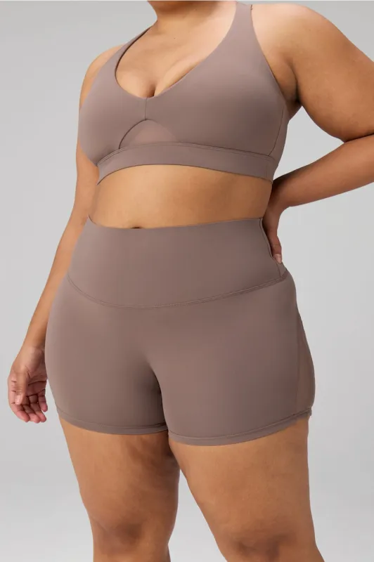 The No-Seam PureLuxe TLC Mesh Short 4" made by Fabletics