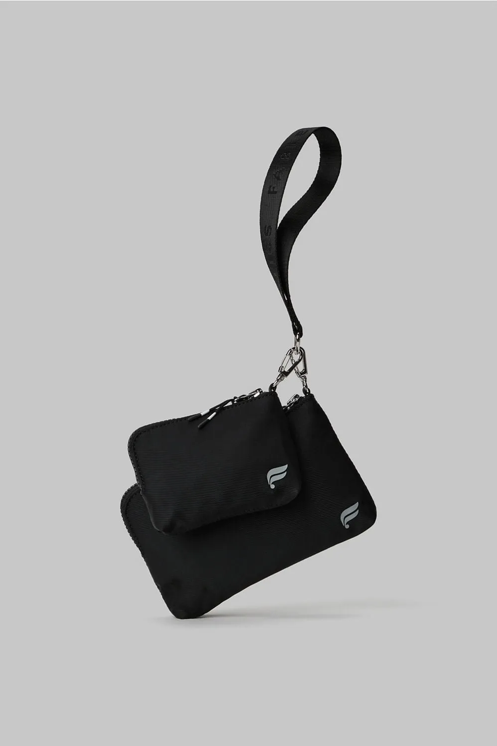 The Grab & Go Wristlet sold by Fabletics