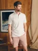 Movement™ Short-Sleeve Pique Polo Shirt - Pure White sold by Faherty