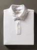 Movement™ Short-Sleeve Pique Polo Shirt - Pure White sold by Faherty