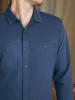 Sunwashed Knit Shirt - Dune Navy sold by Faherty