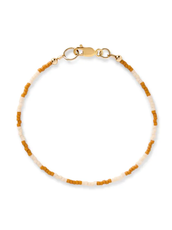 Faherty X Beyond The Sea Seed Bead Bracelet - Golden Ochre Stripe sold by Faherty