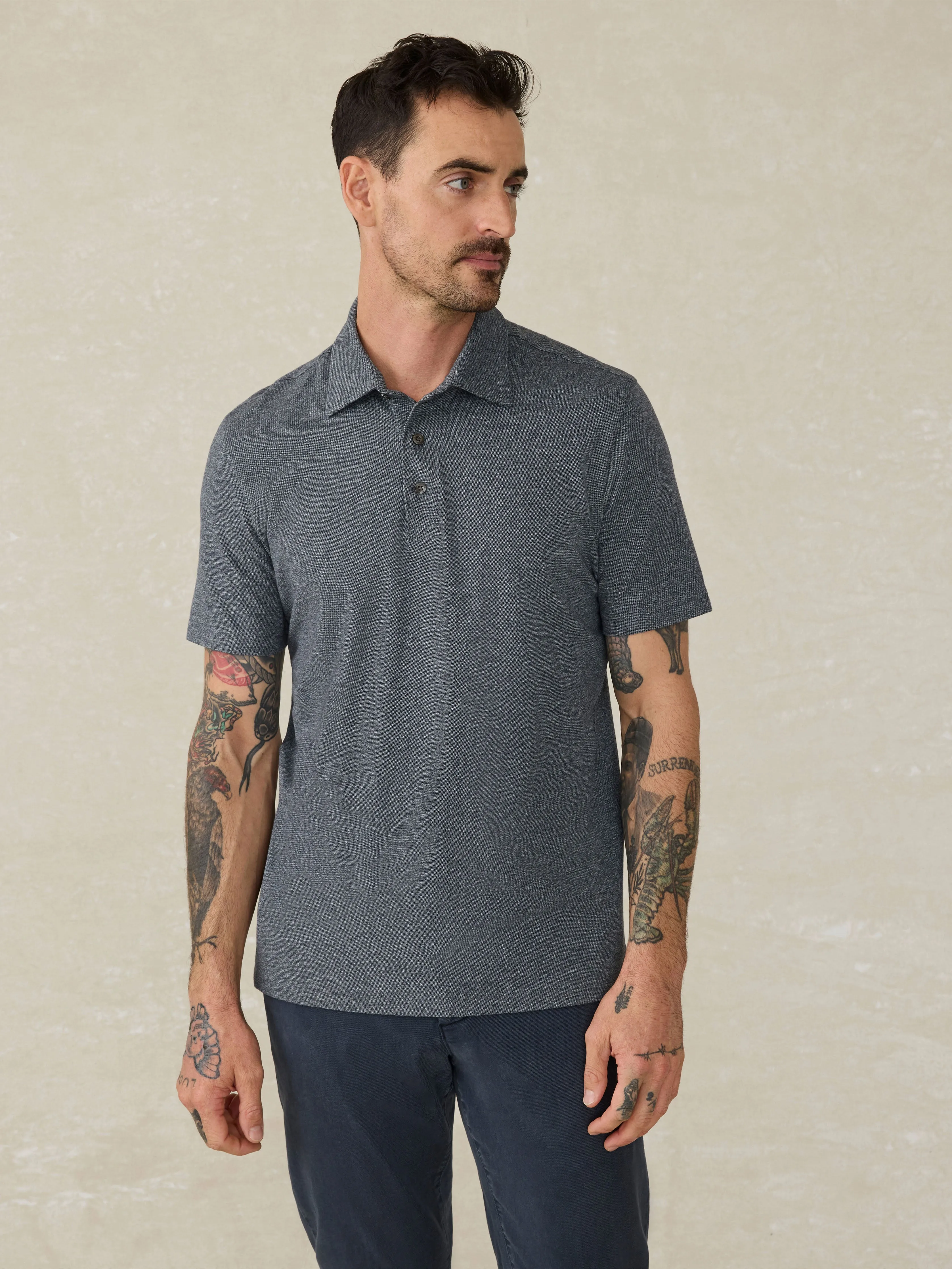 Short-Sleeve Movement™ Pique Polo - Dusty Iron Heather sold by Faherty