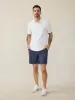 Short-Sleeve Movement™ Pique Polo - Pure White sold by Faherty