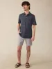 Short-Sleeve Movement™ Pique Polo - Midnight Fishscale sold by Faherty