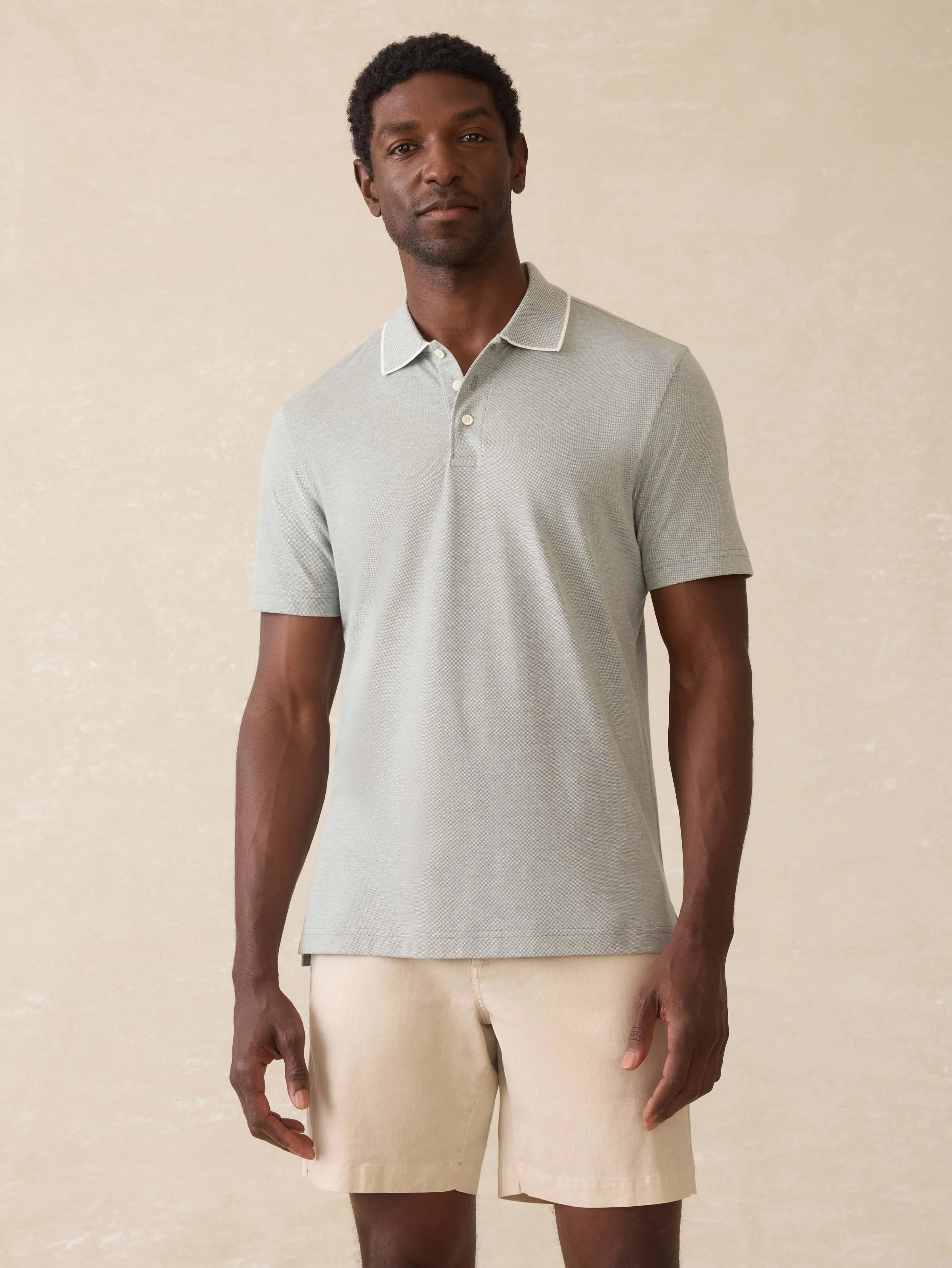 Short-Sleeve Movement™ Pique Polo - Moss Stone Melange sold by Faherty
