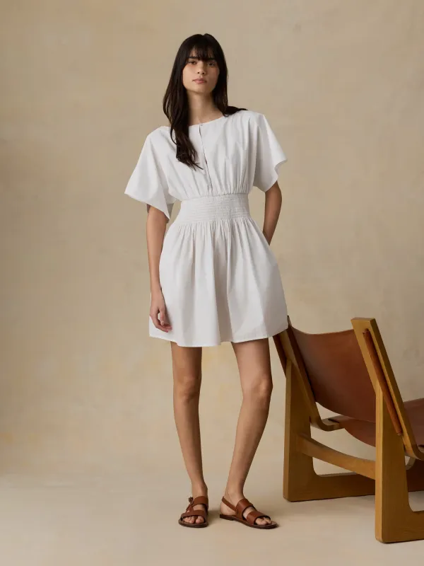 Coastal Poplin Elia Mini Smocked Dress - White made by Faherty