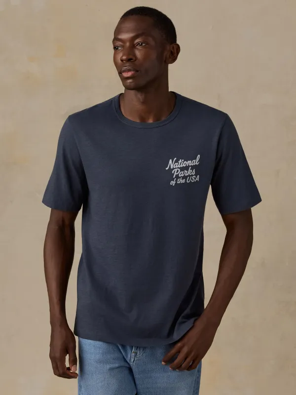 Faherty x Parks Project National Parks Short-Sleeve Sunwashed Regenerative Tee - Dune Navy made by Faherty