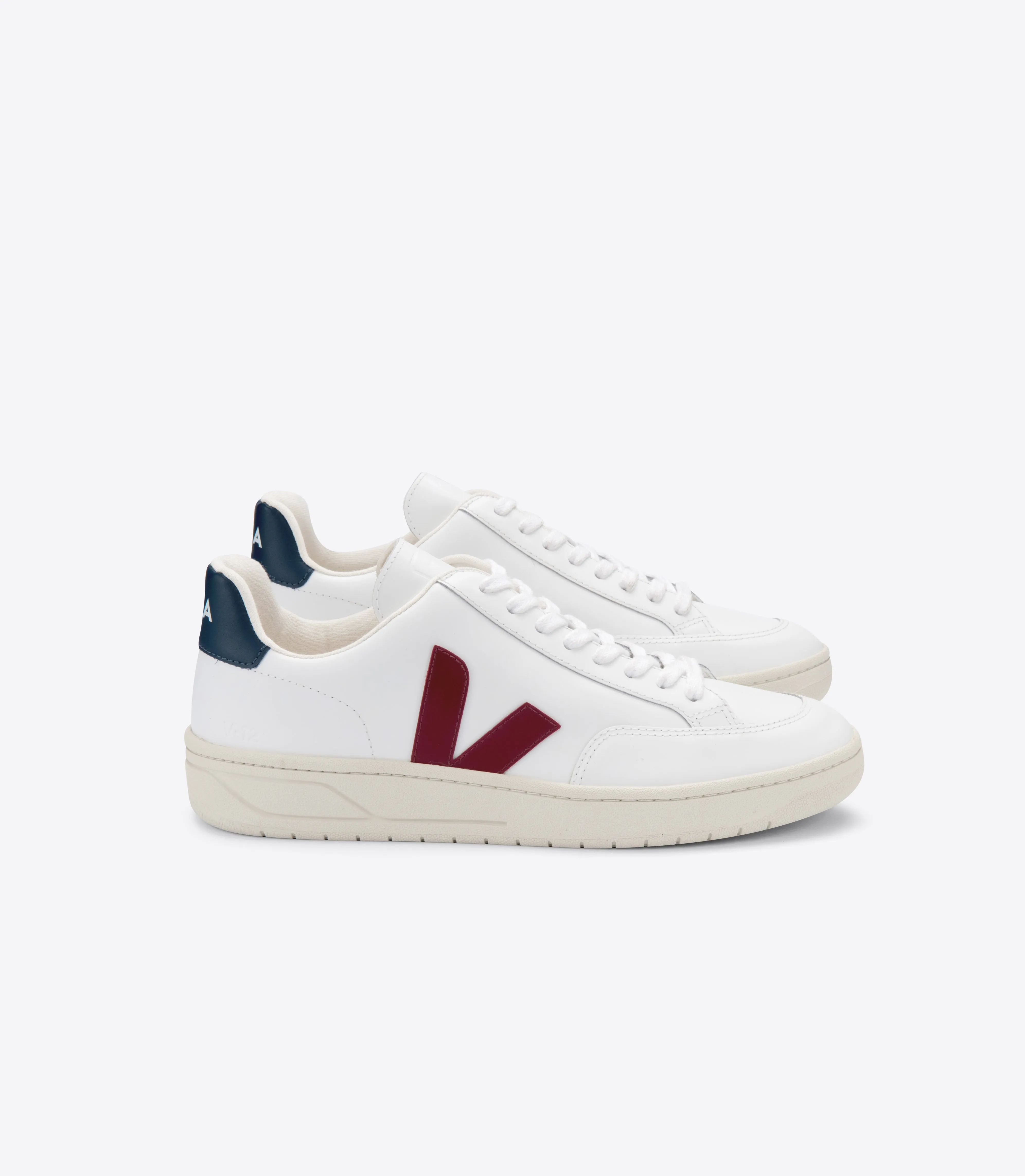 VEJA Women's V-12 - Extra White Marsala Nautico sold by Faherty