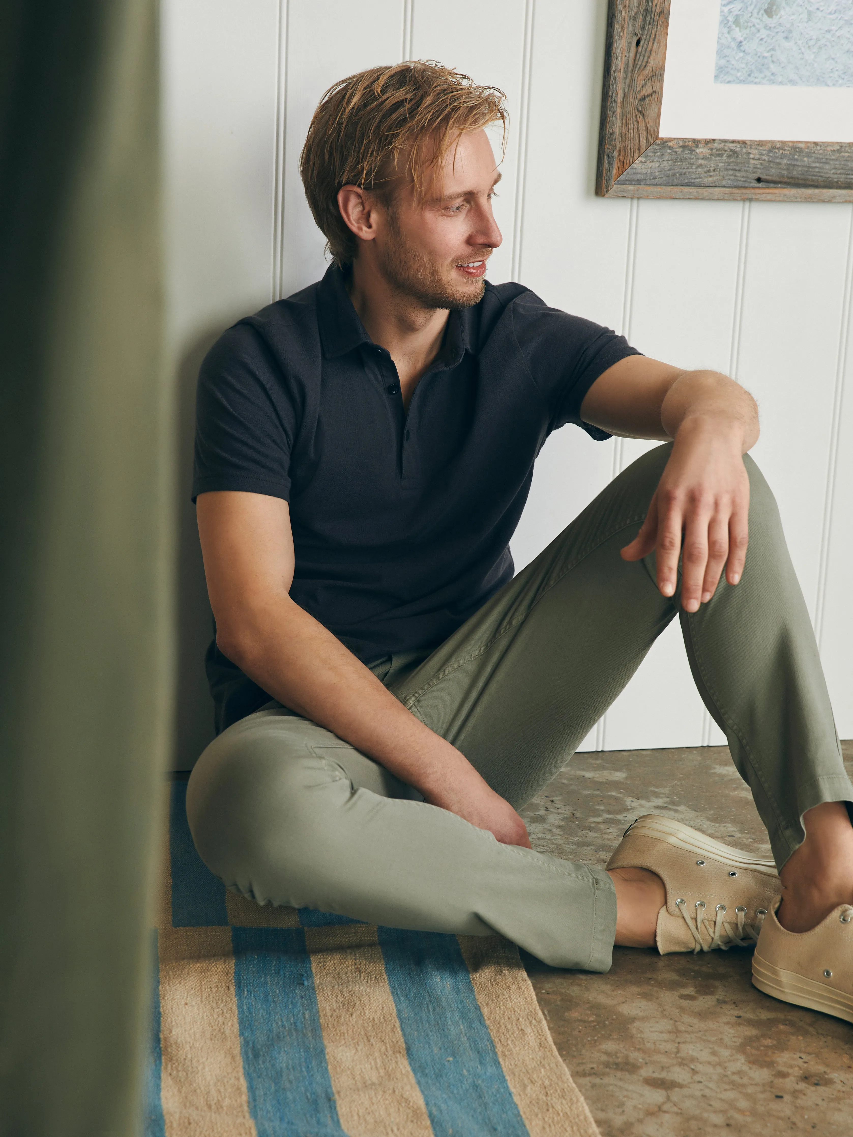 Sunwashed T-Shirt Polo - Washed Black sold by Faherty