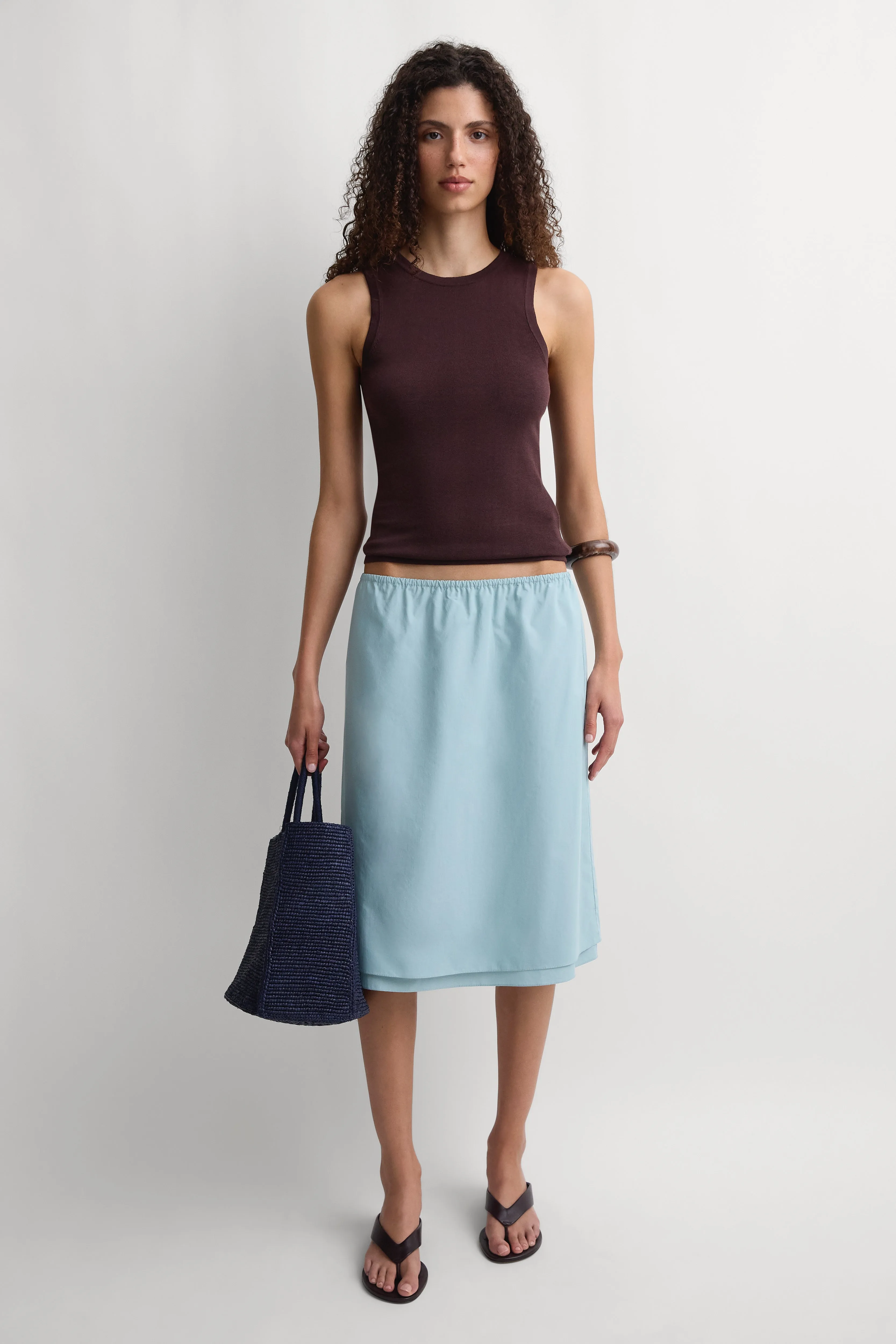 The Knee Skirt Teal sold by Faithfull the Brand