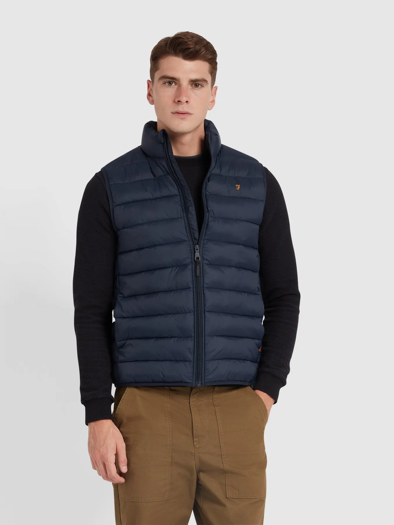 Joel Wadded Gilet In True Navy sold by Farah
