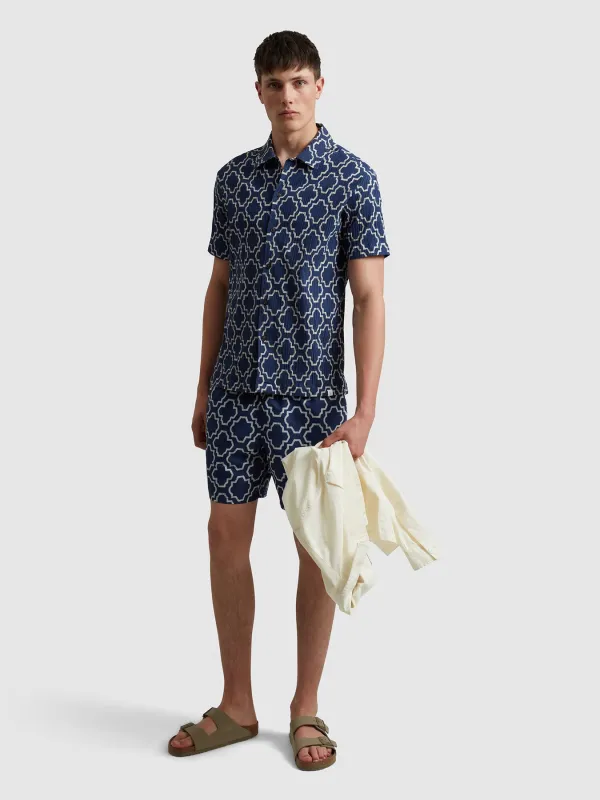 Colbert Medieval Print Swim Shorts In Sigil Blue sold by Farah