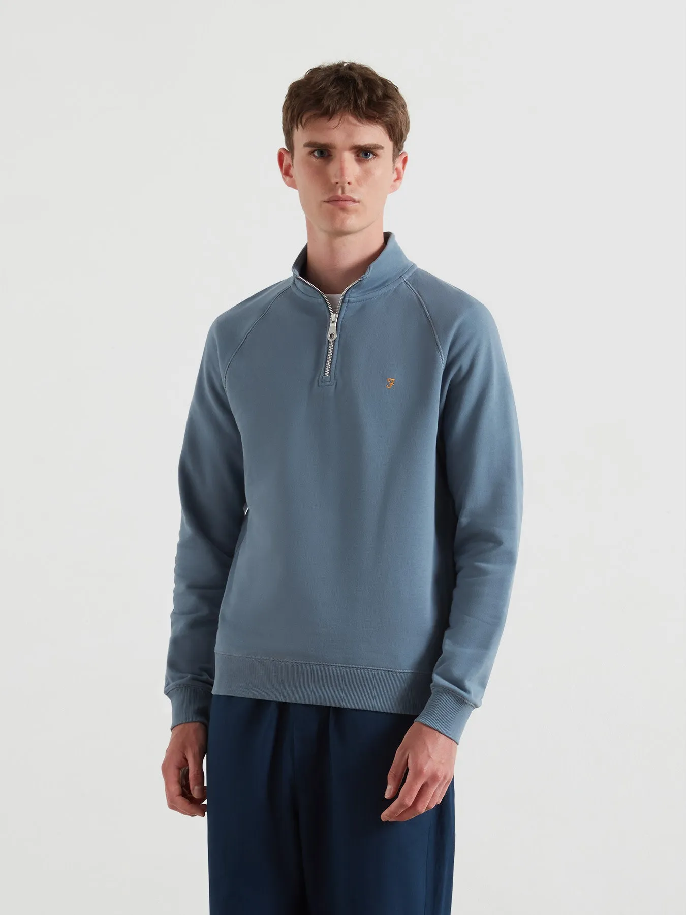 Jim Organic Cotton Quarter Zip Sweatshirt In Chalk Blue sold by Farah