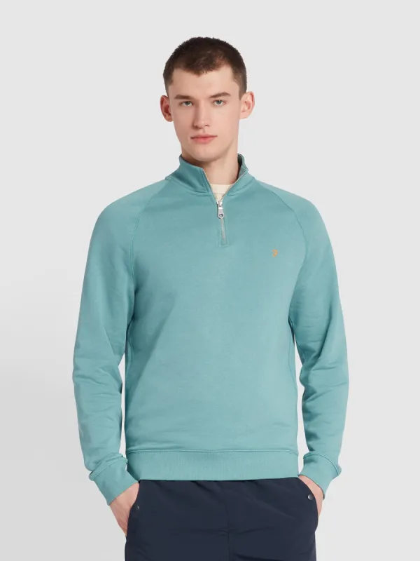 Jim Organic Cotton Quarter Zip Sweatshirt In Brook Blue made by Farah