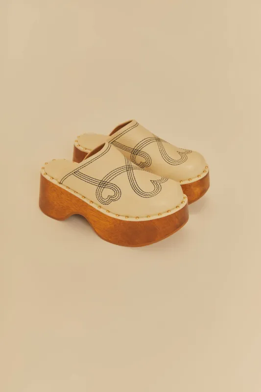 Off White Clog Platform sold by FARM Rio