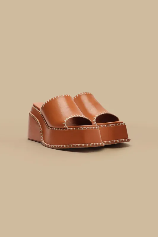 Camel Wedge Mule Sandal sold by FARM Rio