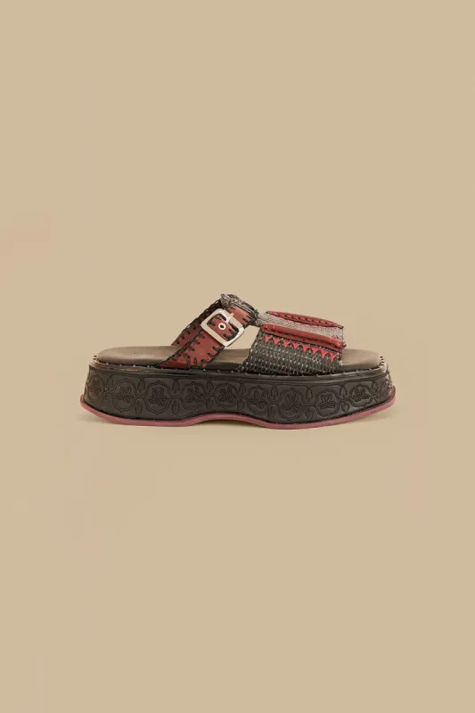 Black Flatform Mule sold by FARM Rio