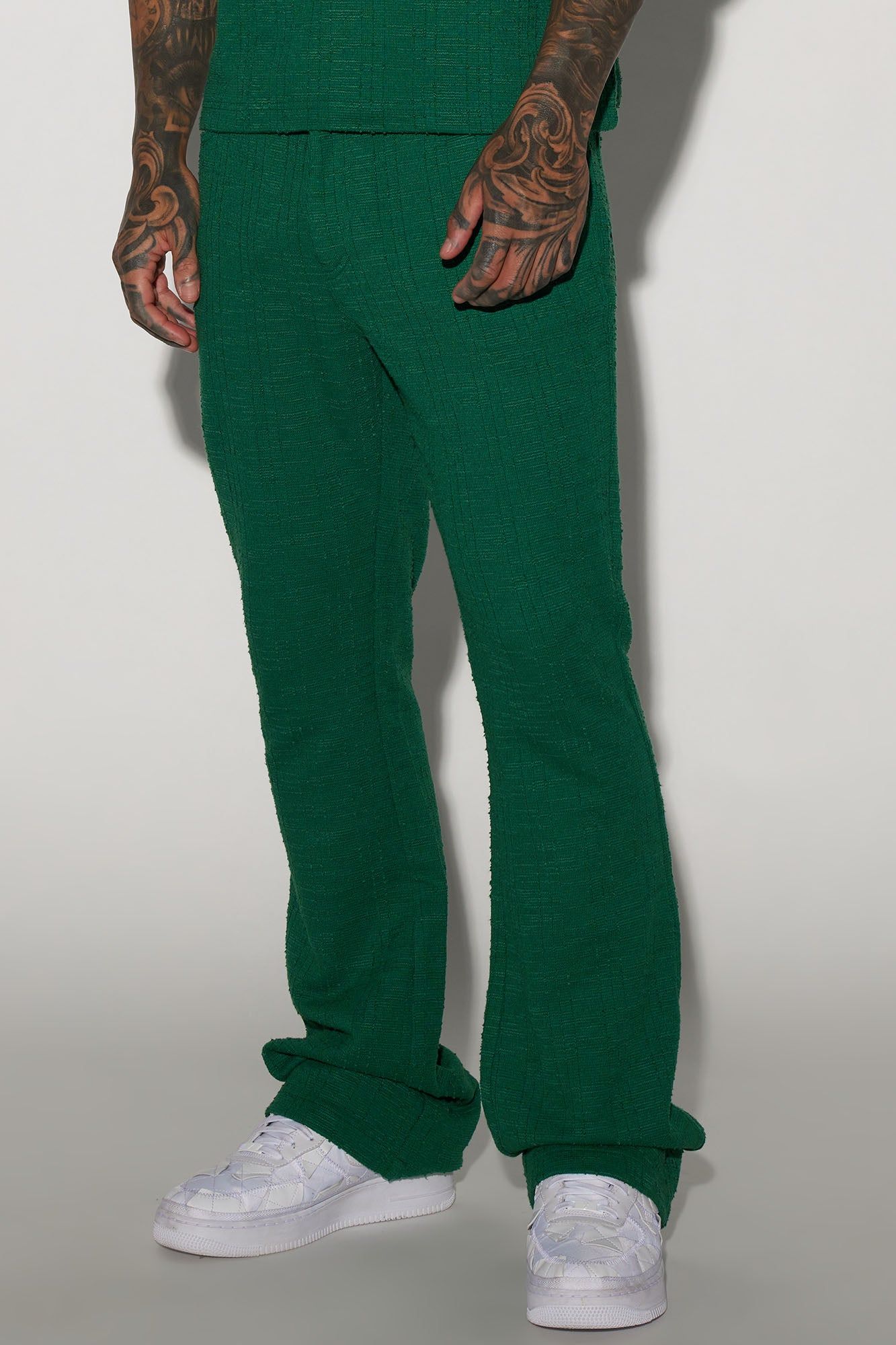 Jordan Textured Stacked Slim Flare Pants - Green sold by Fashion Nova