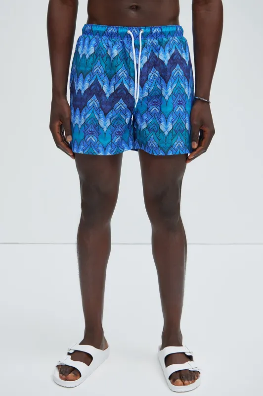 Ocean Glass Swim Trunks - Blue/combo sold by Fashion Nova