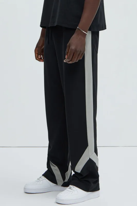 Zedric Relaxed Track Pants - Black sold by Fashion Nova