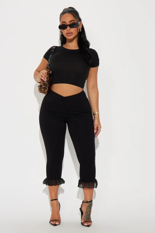 Charlotte Ruffle Capri Legging - Black sold by Fashion Nova