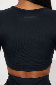 Running In Circles Elevate Active Top - Black sold by Fashion Nova