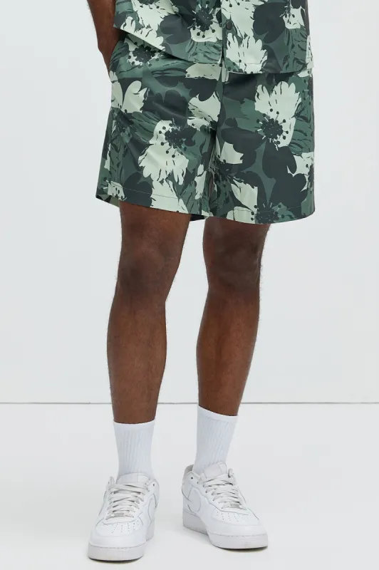 Elmore Floral Warm Up Shorts - Green/combo sold by Fashion Nova
