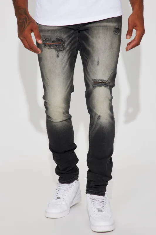 Send It Over Stacked Skinny Jeans - Black Wash sold by Fashion Nova