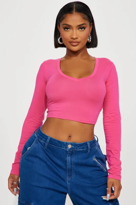 Carly V Neck Crop Long Sleeve Tee - Fuchsia sold by Fashion Nova