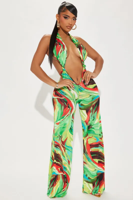 Coastal Cruise Jumpsuit  - Green/combo sold by Fashion Nova